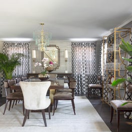 Dramatic dining room with custom hand painted wallpaper and drapes 