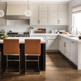 Open kitchen with neutral tones and bold accents.