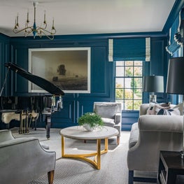 Living Room with Grand Piano and Blue Millwork