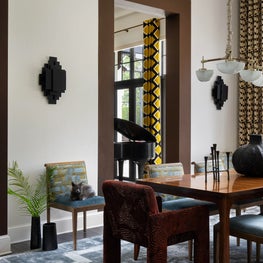 Dramatic Dining Room With High Ceilings