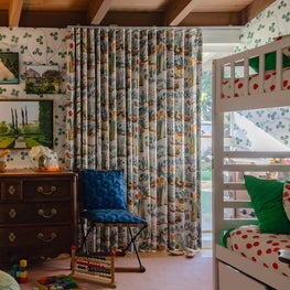 Eclectic Girl's Bedroom with Colorful Power Clashing Patterns and Collected Vintage