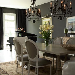 Marietta Residence Dining Room with Charcoal walls & two chandeliers