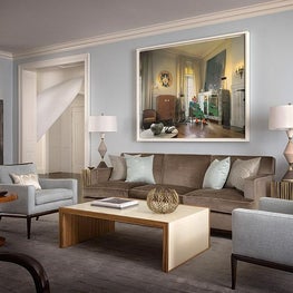 Luxurious vintage and contemporary furniture in a clean lined Living Room.