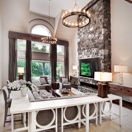 Suburban High Ceiling GreatRoom with Custom Sofa Wraparound Console