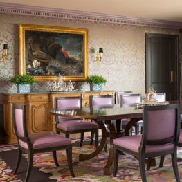 Green, black, and purple makes an elegant and dramatic Dining Room
