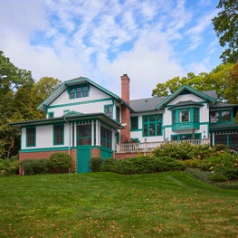 Historic Lake House: Turn of the century home with white siding & green trim. Architect: John Hagenah.