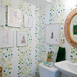 Guest Bathroom with costume sketches & wallpaper