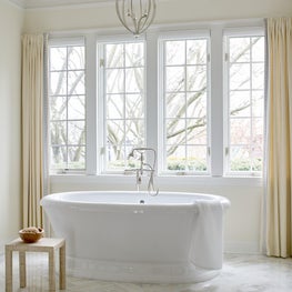 Traditional Master Bath with Herringbone Marble Floors