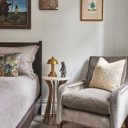 Cozy bedroom with folk art details and soft textures