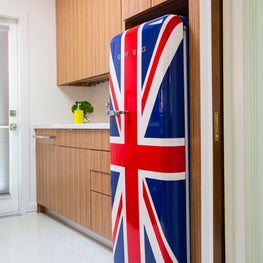 Portfolio: Butler's Pantry in 1950's home featuring custom cabinetry and bold refrigerator