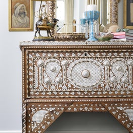 Guest bedroom vanity with antique accents