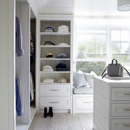 a simple master closet for a beach house