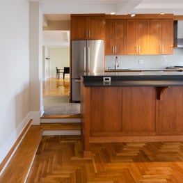 Modern Open Kitchen with Cherry Honey Custom Island and Cabinetry