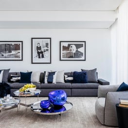 Contemporary family room featuring bespoke photograph collection