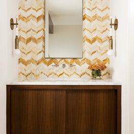 Portfolio: Gorgeous powder room vanity with a yellow pattern backdrop