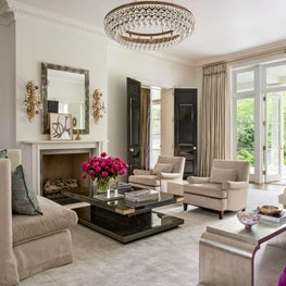 Glamour neutral and black living room with chandelier