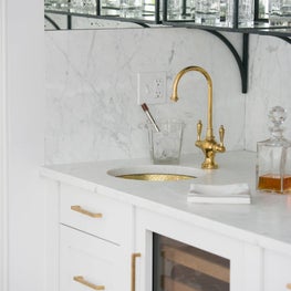 Bar with Custom Shelving and Mixed Metals