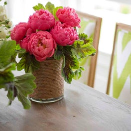 Dining Tabletop Vignette with Upholstered Dining Chairs and Peonies