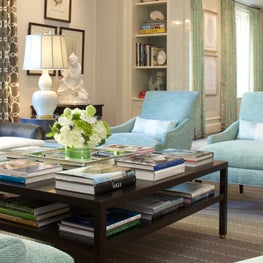 Park Avenue penthouse, Aqua living room with custom built in shelves