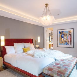 Master bedroom with tray ceiling and cove light