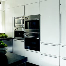 Timeless, sleek white NYC Apartment kitchen 