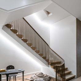 Upper East Side Townhouse main stair in fumed oak and bronze