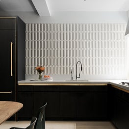 Lively three dimensional tiles and high contrast palette in a Park Ave kitchen