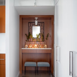 Gold Coast Residence View into Foyer with Bespoke Teak Credenza.