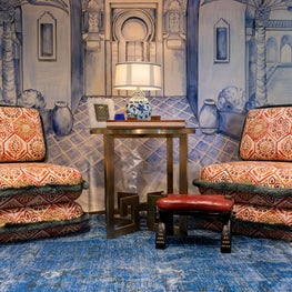 Designer House - Custom chairs with stacked cushions in batik fabric and fringe