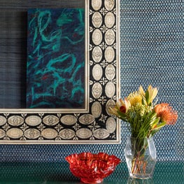 Portfolio: Simple Entry Vignette with a Textured Wallcovering and Large Mirror