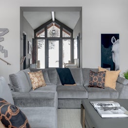 The view from the great room towards the foyer is welcoming and cozy.