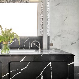 Master Bath with Black & White Tub Deck