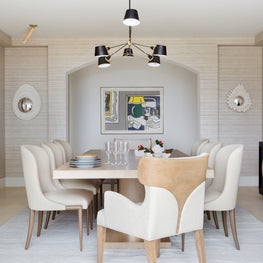 Portfolio: A modern dining room in tonal shades, Theodore Alexander chairs, and a Roy Lichtenstein in Pebble Beach, CA.