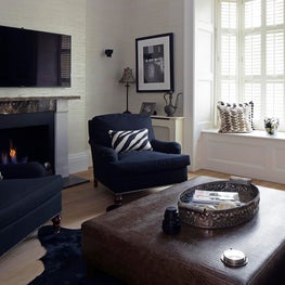 TV room with marble, textures and monotone colouring 