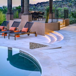 Columns, porticos and rounded overhangs are the perfect backdrop for this relaxing entertainment venue.