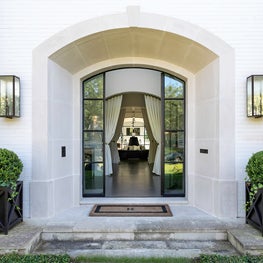 Portfolio: Front exterior of Garnet Residence in Southside Place, TX—furnished by Laura U.