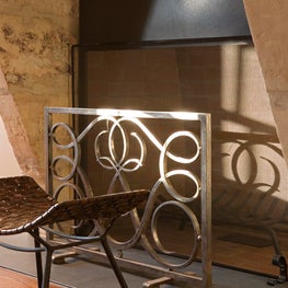 Westchester estate. Detail of the living room with Sube fire screen