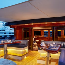 Palm Beach Yacht Deck with Banquette, Triangular Tables, Blue Leather, Lighting