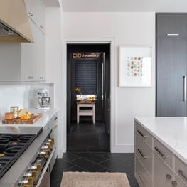 The Mountain Lane butler's pantry sits right off the kitchen and features a cozy coffee station and plenty of storage.