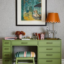 Childrens room with painted desk and playful accessories