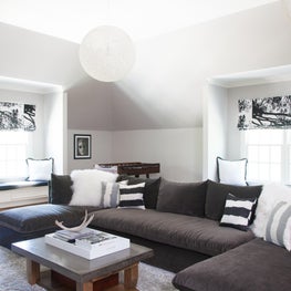 Neutral Living Space in Nashville. Velvet Sectional, Window Seats, Custom Romans