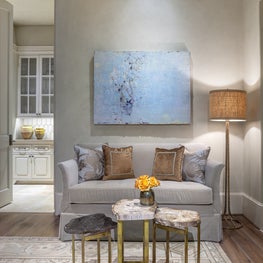 Warm sitting area with petrified wood accent tables; Houston, TX