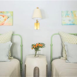 A playful palette combined with subtle pattern gives guests a cheerful welcome. 