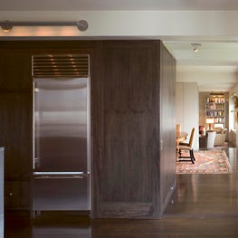 Upper West Side Apartment, Kitchen detail with dark stained Anigre wood cabinets