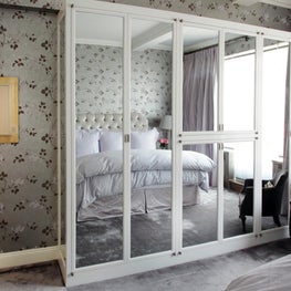 Master Bedroom closet, mirrored doors, floral wallpaper