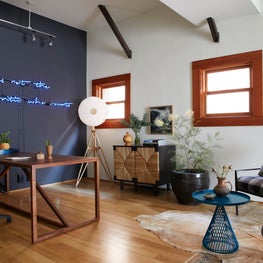 Office in Venice Beach with Neon Accent, Navy Wall and Plaid Chairs