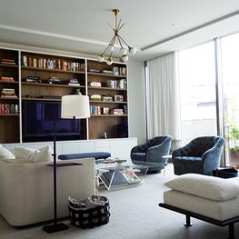 Minimal drapes ease into the background of this contemporary living room.