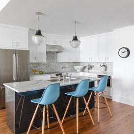 Custom Kitchen with high gloss cabinets and mosaic backsplash 