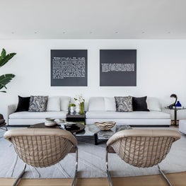 Contemporary living featuring an eclectic art collection 