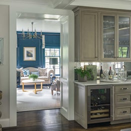 Open Plan and Living Room with Stained Wood Cabinetry